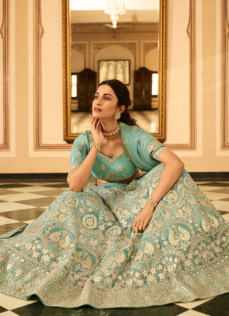 Teal Blue Golden Embroidered Organza Lehenga Choli