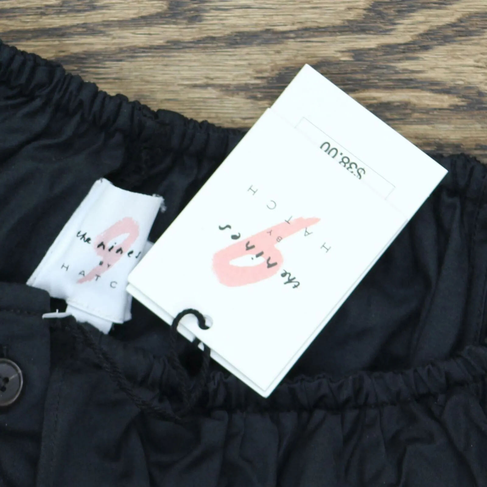 The Nines by HATCH Flounce Off The Shoulder Button-Front Maternity Jumpsuit